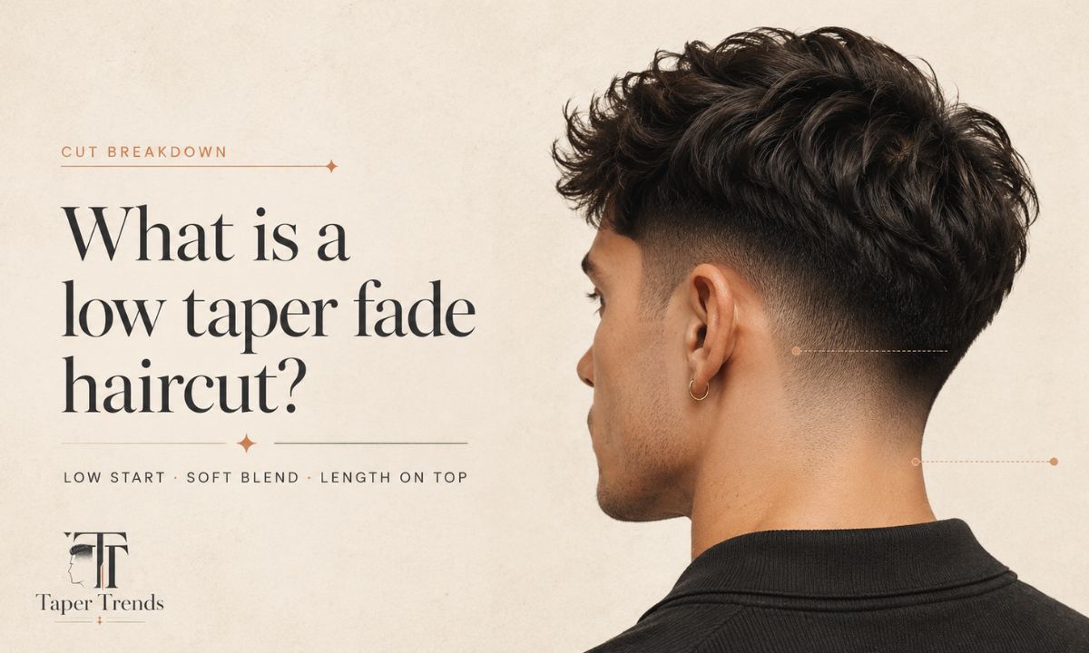 Close-up of a low taper fade haircut showing the gradual taper around the sideburns and ears.
